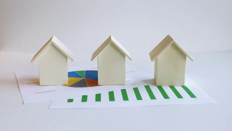 Mortgage comparison concept showing multiple homes placed over financial charts representing different mortgage term choices