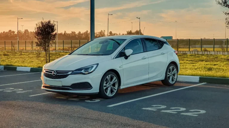 Comprehensive Car Insurance coverage for a modern white family car parked outdoors in 2026