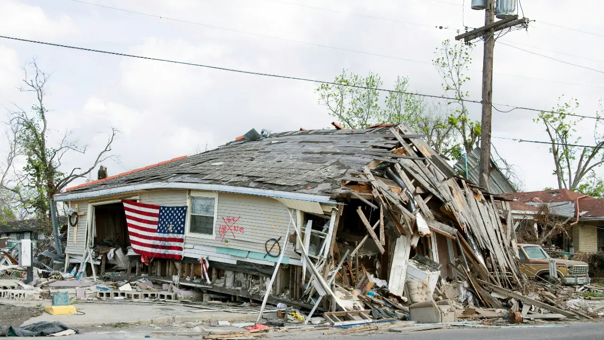 Severely damaged home after disaster showing the real risk covered by Liability Insurance