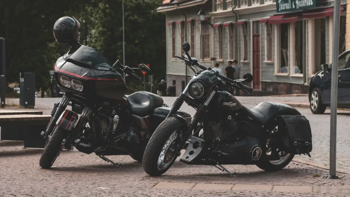 Cruiser motorcycles parked on a street representing motorcycle insurance costs in 2026